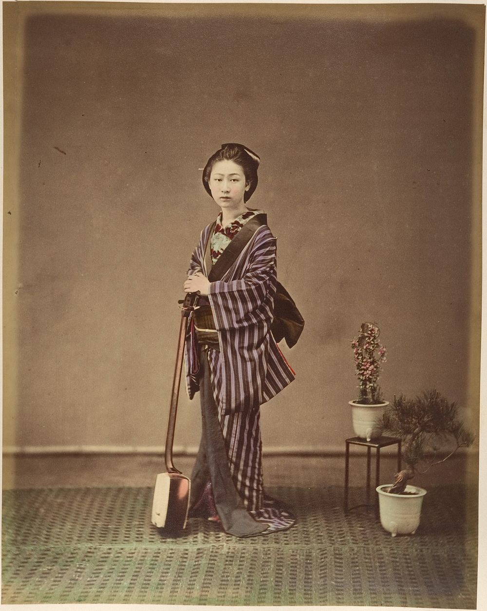 [Japanese Woman in Traditional Dress Posing with Instrument]