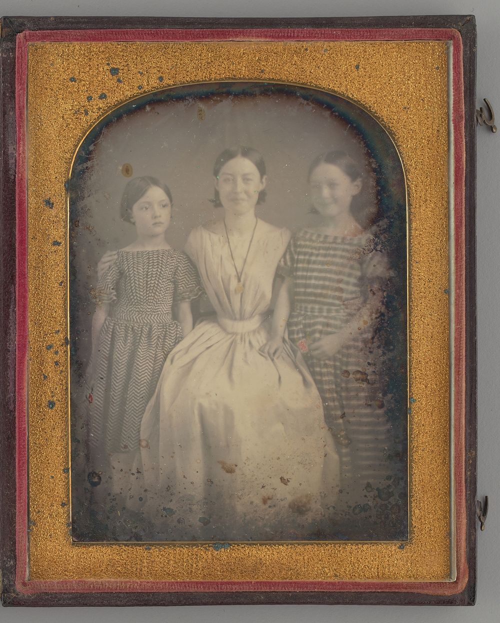 Untitled (Portrait of a Woman with Two Girls) by Unknown Maker