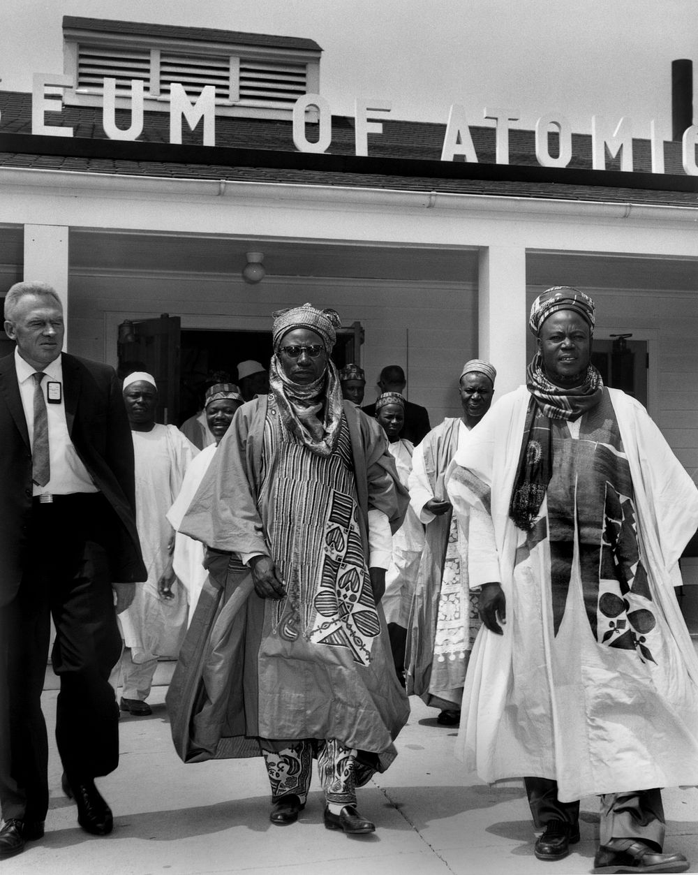 Premier of Nigeria Sir Ahmadu Bello far right leaving the Atomic Museum Oak Ridge