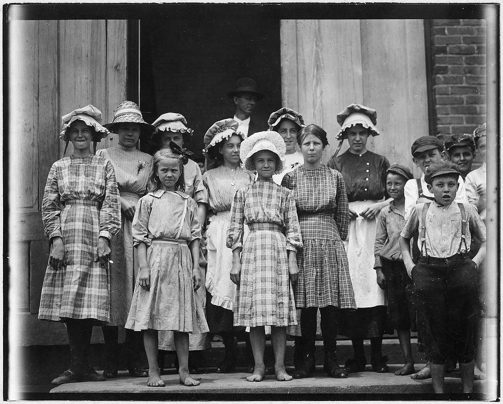Some of the young girls working in the Pelzer Mfg. Co. Not the youngest. Some of them seem surely under 12, May 1912.…