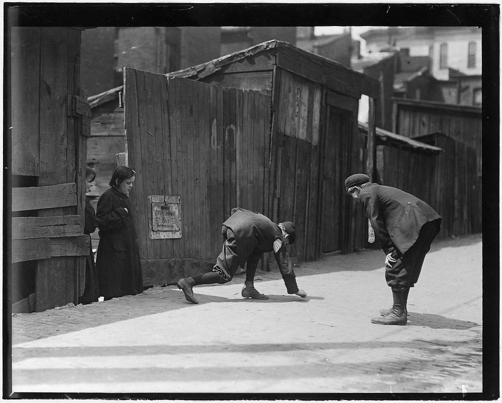 Truants, Red St. Clair, and chum shooting craps in front of Murphy's Branch at 11:00 A.M. a school day, May 1910.…