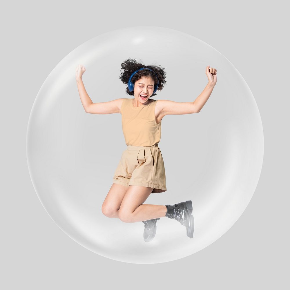 Happy girl in bubble, listening to music