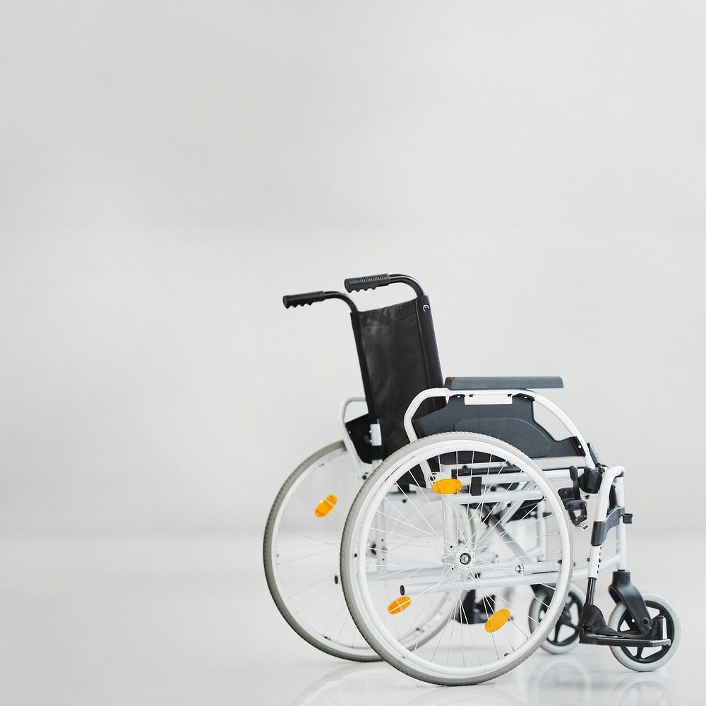 Empty wheelchair, hospital image with copy space