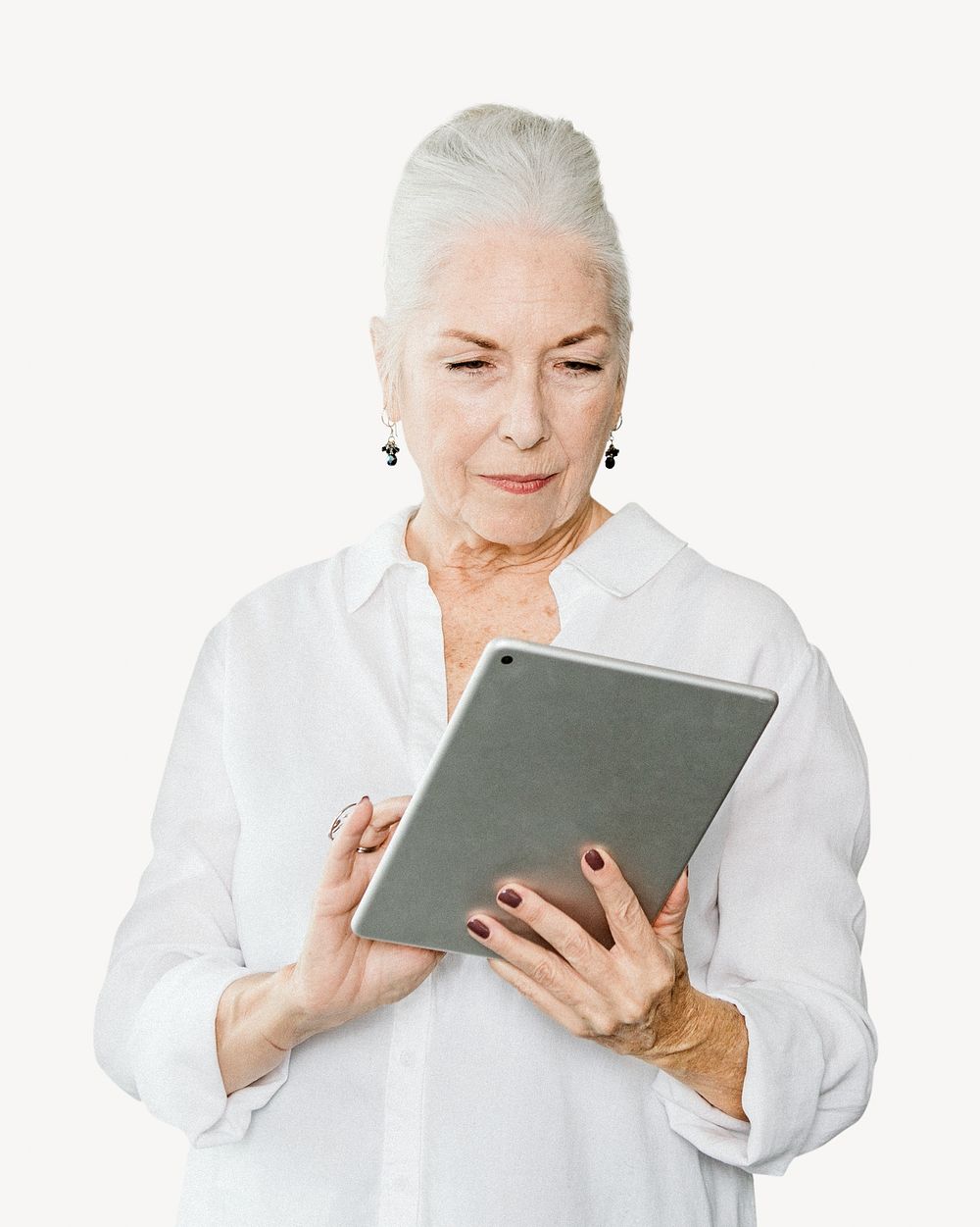 Senior woman using tablet isolated image on white