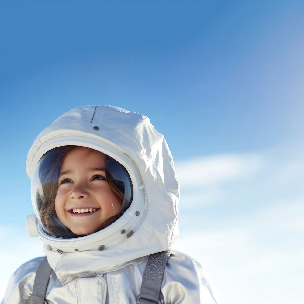 a photo of smiling girl child dressed as astronaut. AI generated Image by rawpixel. 