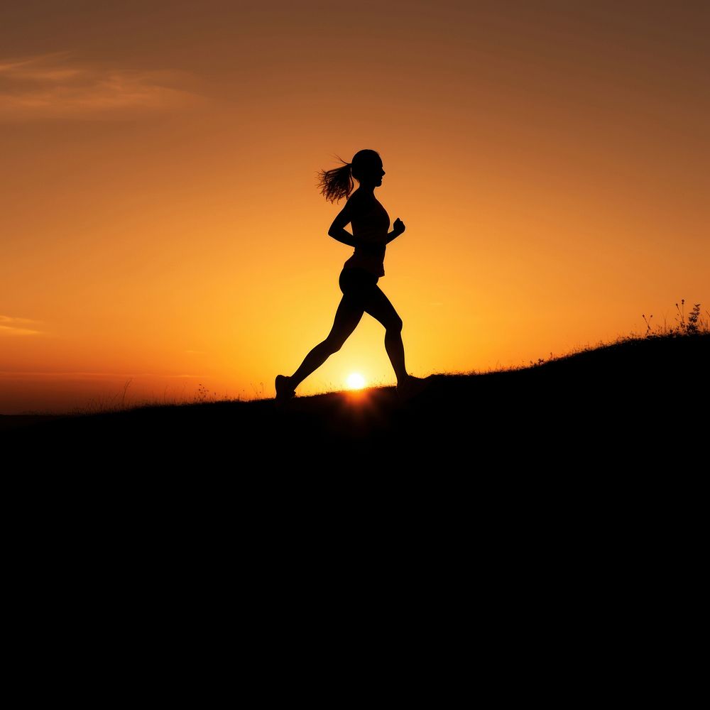 photo of silhouette woman run on the hill with sunset. AI generated Image by rawpixel.