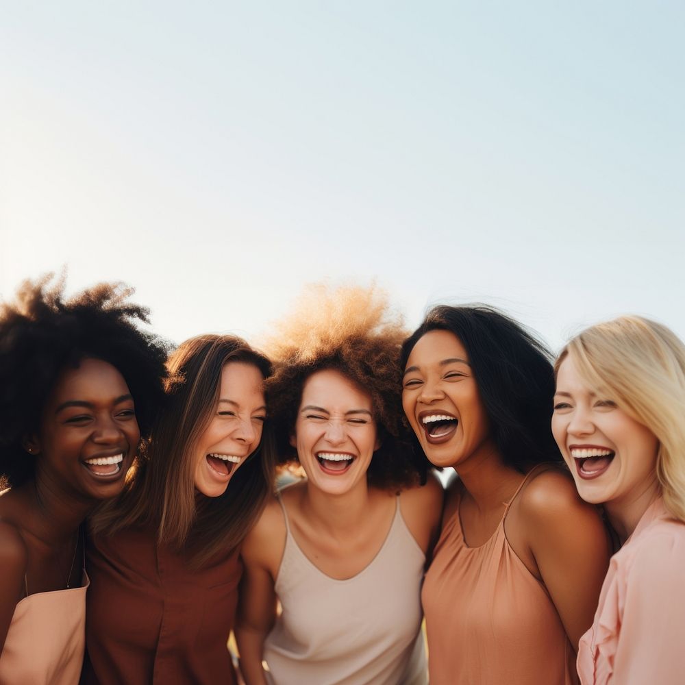 Different race women laughing adult togetherness. 