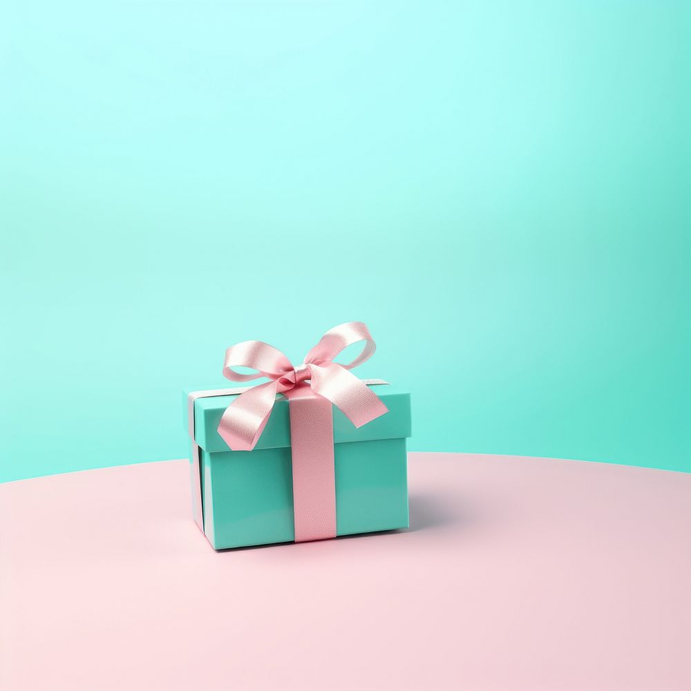 A turquoise gift box pink bow celebration. AI generated Image by rawpixel.