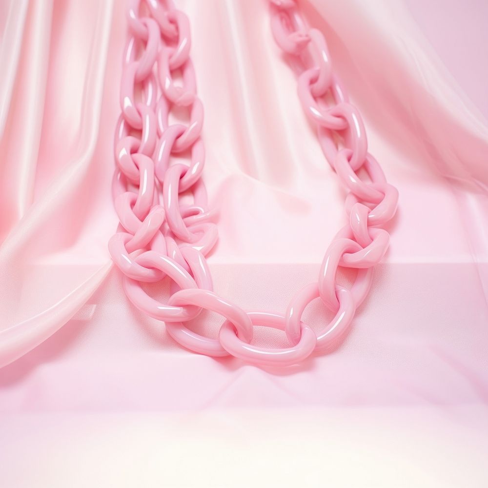 Pink plastic chain necklace jewelry accessories.