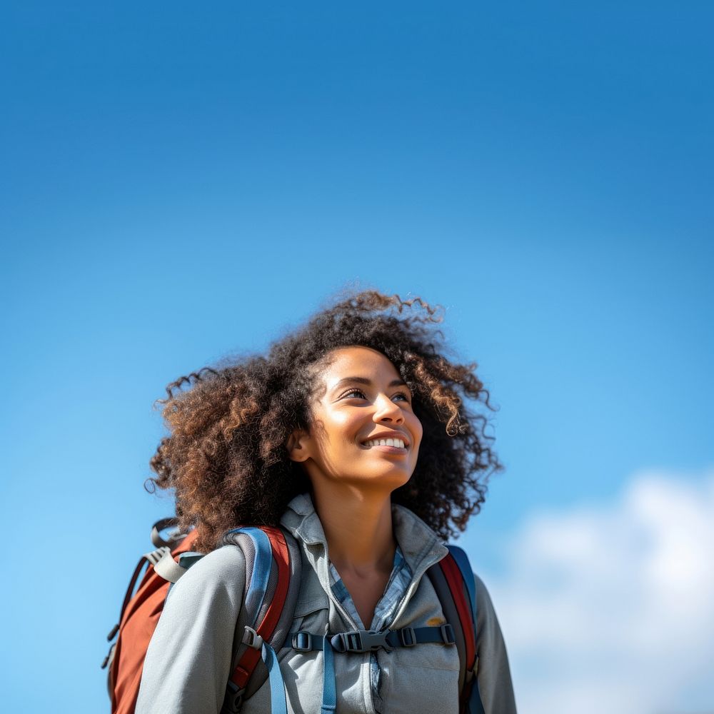 Indian woman hiking backpack looking smile. AI generated Image by rawpixel.