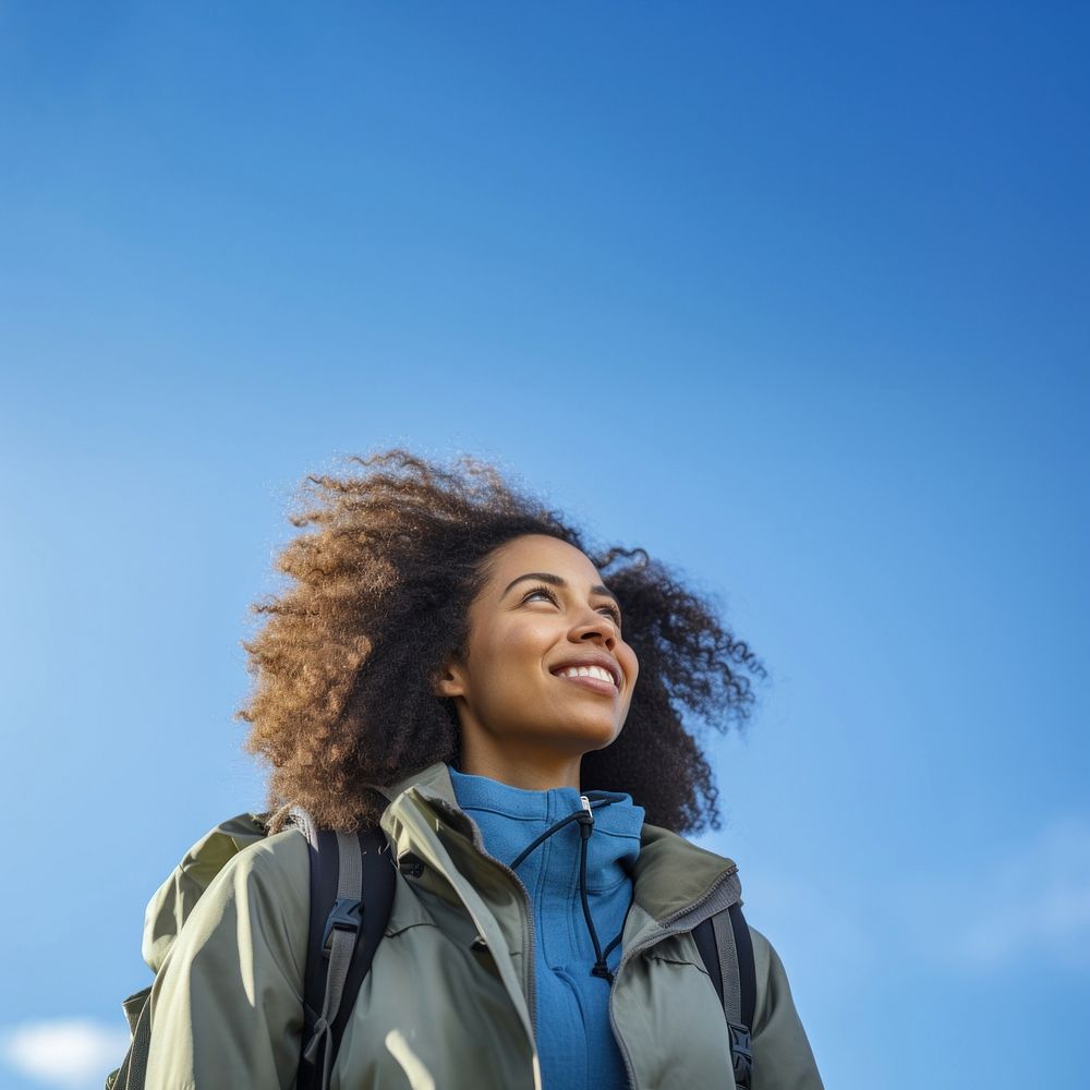 Woman hiking looking jacket smile. AI generated Image by rawpixel.