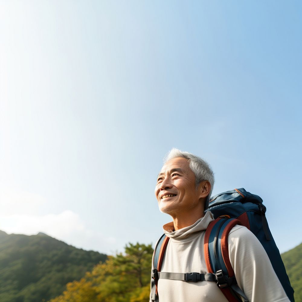 Senior man hiking backpack sky tranquility. 