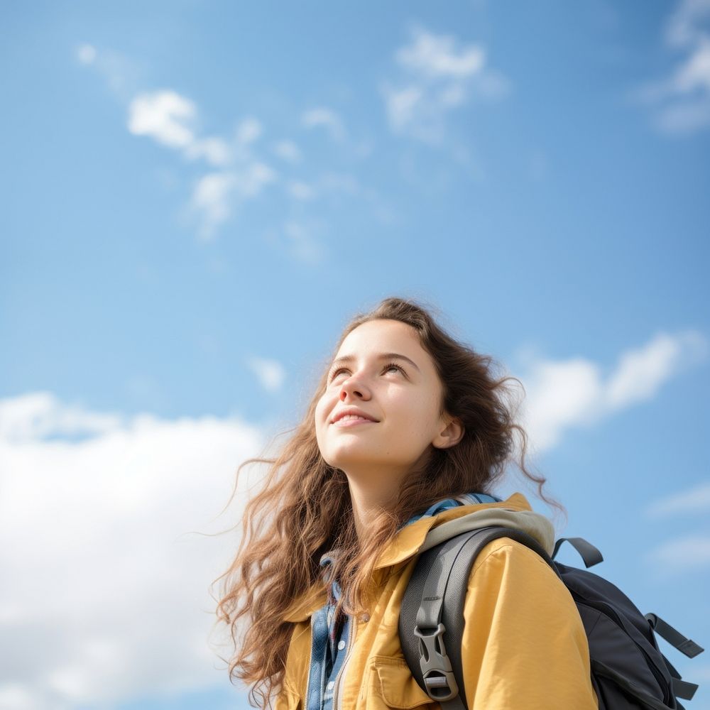 Teenager study abroad backpack sky adventure. 