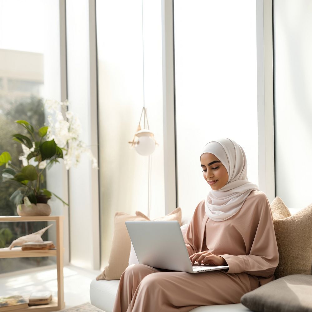 Woman working on laptop. 