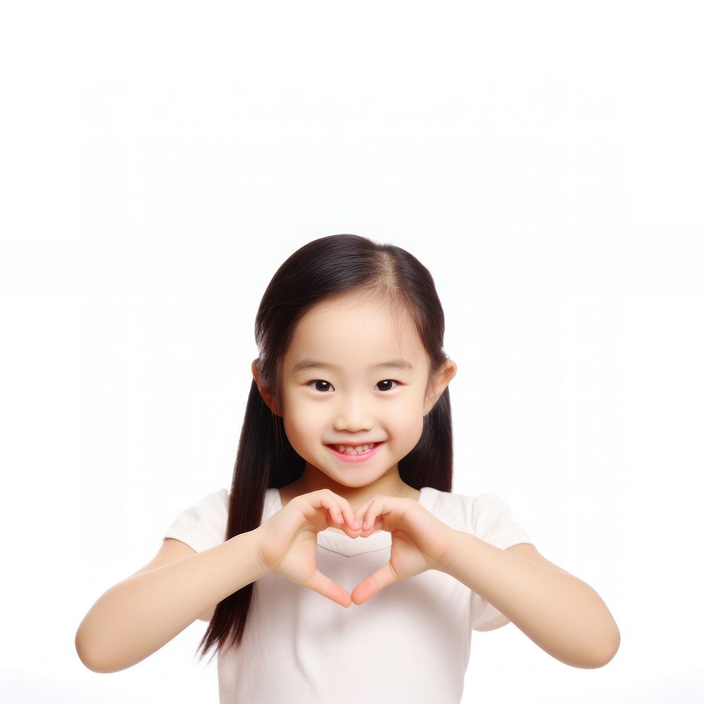 Asian girl with heart-shaped hands. AI generated Image by rawpixel.