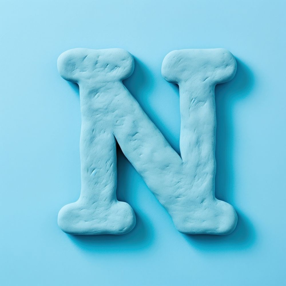 N letters plasticine text turquoise blue. AI generated Image by rawpixel.
