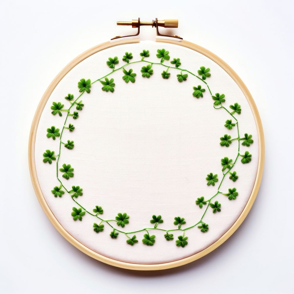 Lucky clover circle border embroidery pattern dishware. AI generated Image by rawpixel.