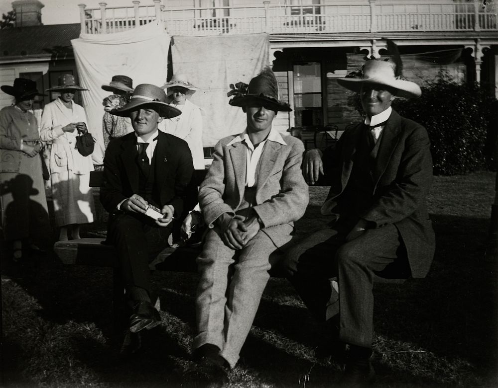 Three seated men (1922) by Leslie Adkin.