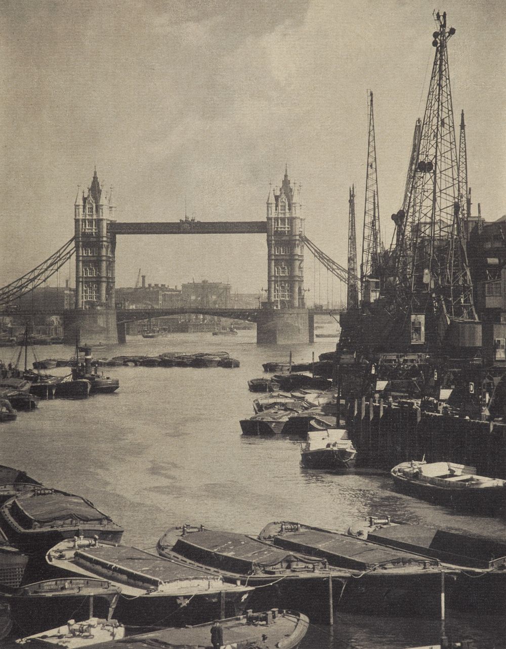 The pool and Tower Bridge. From the album: Photograph album - London (1920s) by Harry Moult.