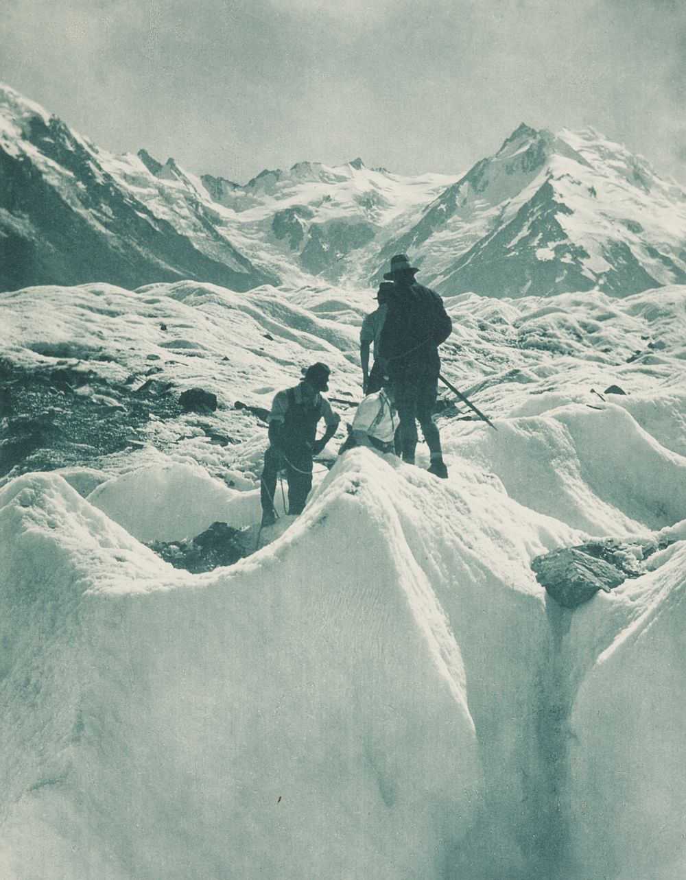 On the Tasman Glacier, Mt Cook district. From the album: Record Pictures of New Zealand (1920s) by Harry Moult.