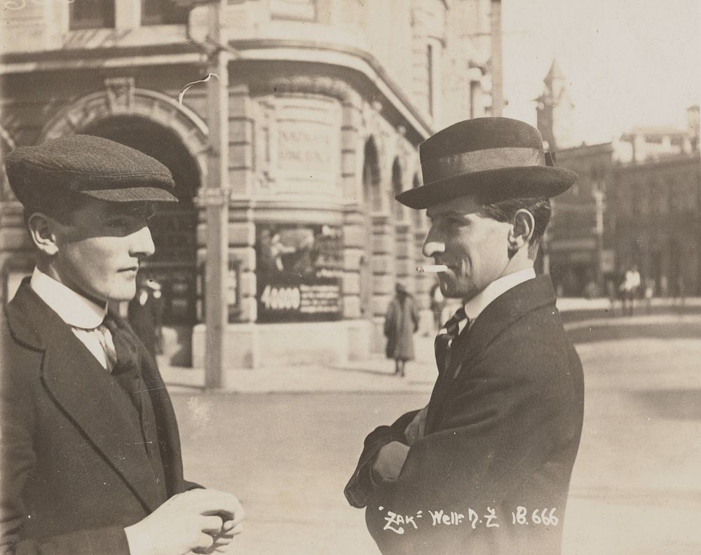 Two men in city street (1907-1915) by Zak Joseph Zachariah.