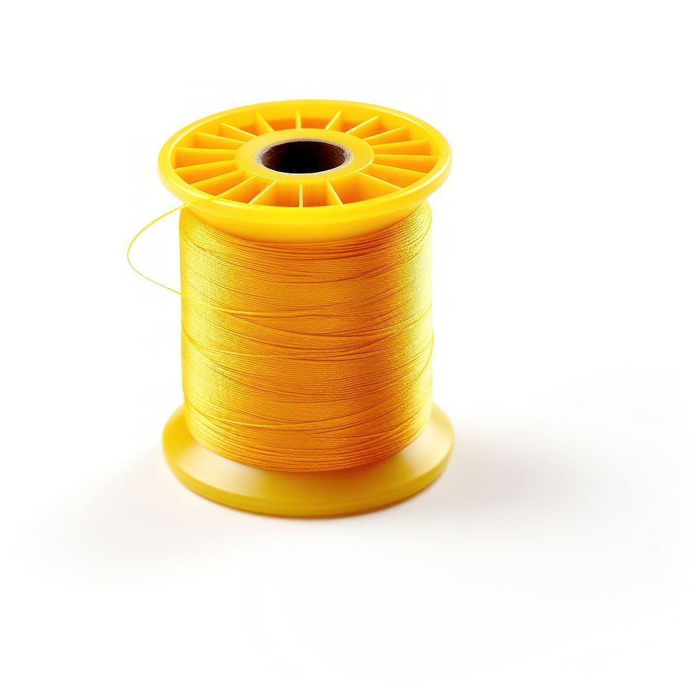 Spool of thread yellow white background equipment. AI generated Image by rawpixel.