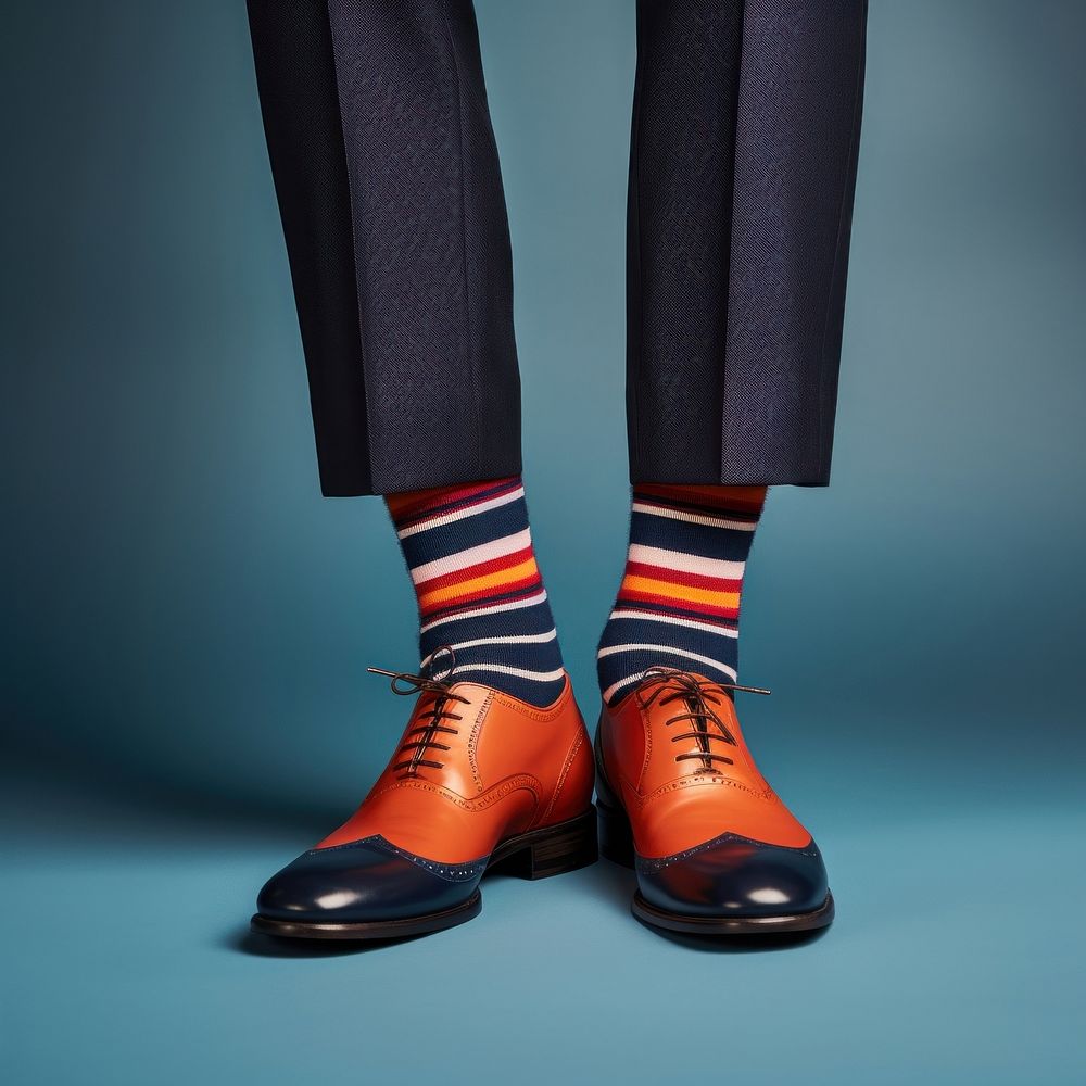 A person wearing a pair of shoes with cute socks footwear studio shot clothing. AI generated Image by rawpixel.