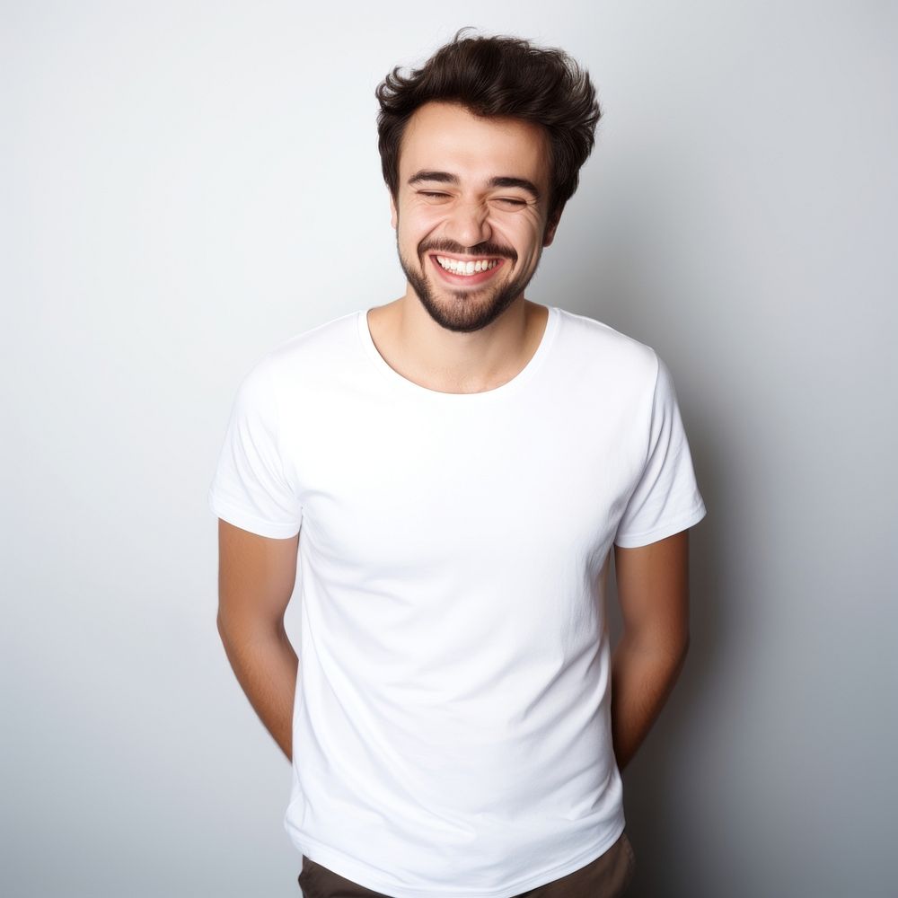 Man t-shirt laughing smiling. AI generated Image by rawpixel.