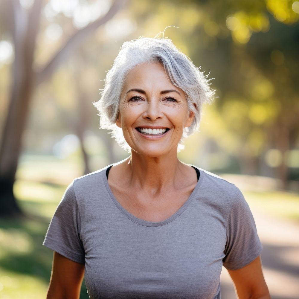 Happy senior woman portrait smiling adult. AI generated Image by rawpixel.