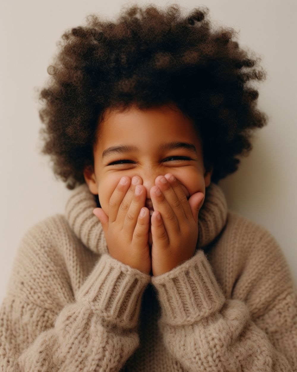 Black kid in sweater smiling happy hand face. AI generated Image by rawpixel.