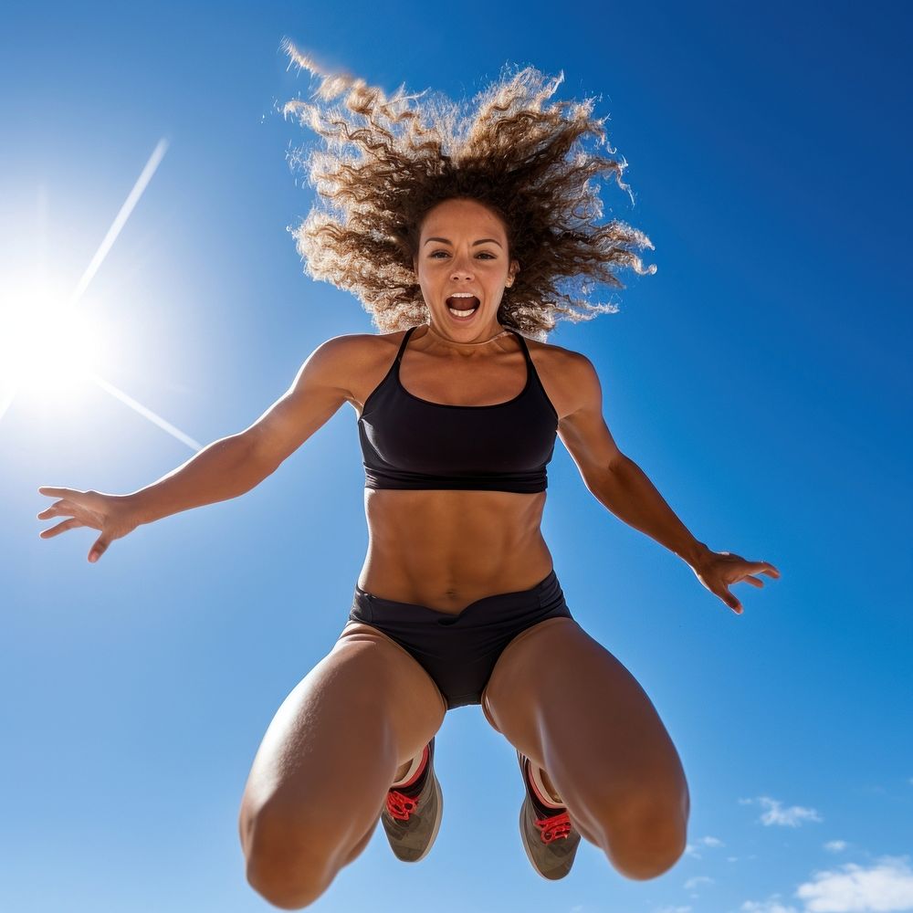 Frizzy young female athlete jumping sunny adult. AI generated Image by rawpixel.