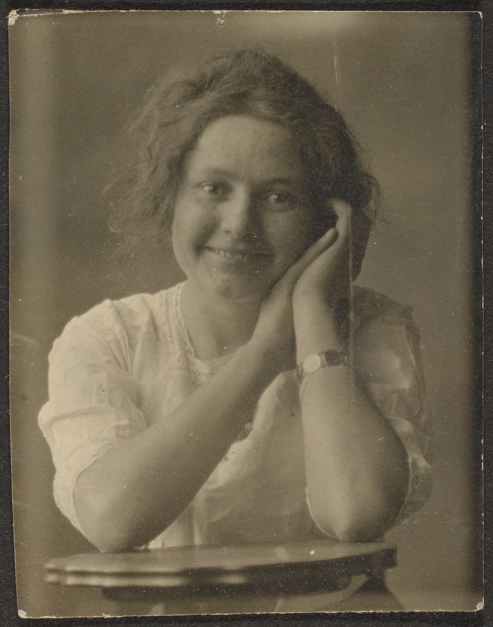 Portrait of a Woman Leaning on Table by Louis Fleckenstein