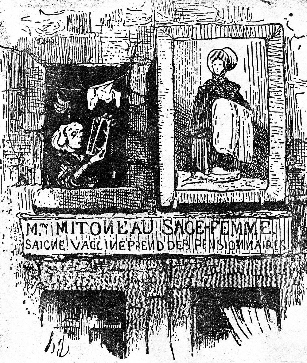 The workplace of a female healer (midwife and surgeon), with signboard, from outside. Reproduction of wood engraving after…