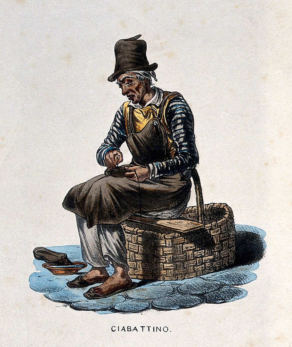 A man is sitting on a plank laid across his basket, making slippers. Coloured lithograph.