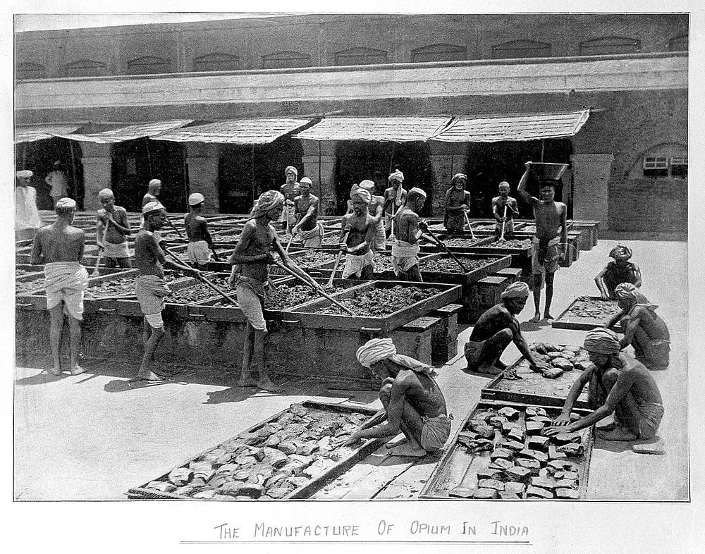 Indian workmen mixing and balling opium in a courtyard in Calcutta. Process print after a photograph by Bourne & Shepherd…