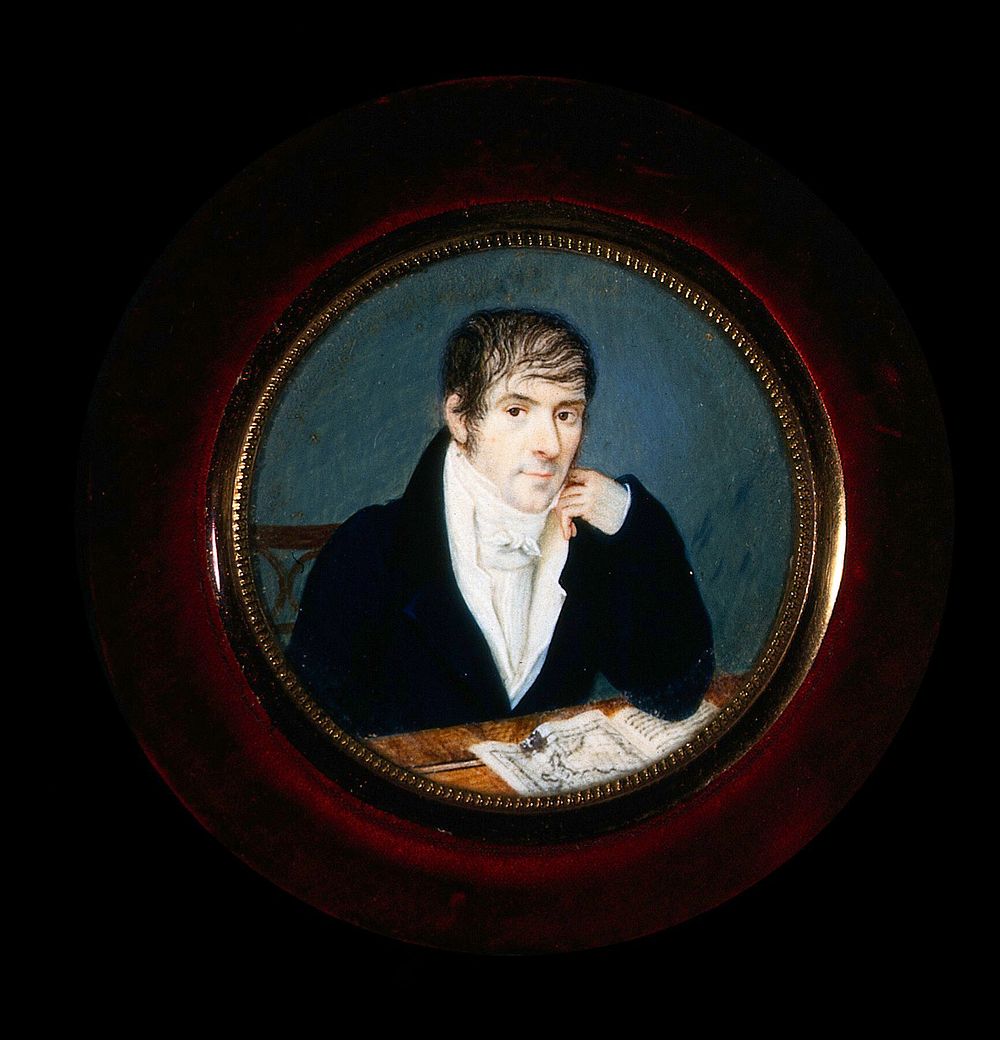 A man seated at his desk with a map of southern Italy and Sicily before him. Gouache painting, ca. 1800.