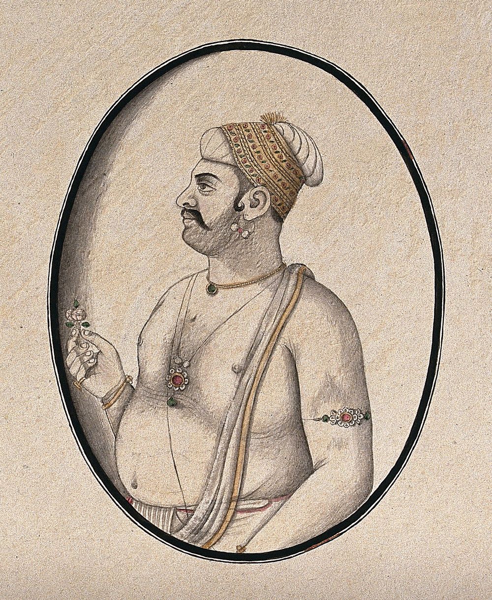 A bare chested man holding a flower. Watercolour drawing by an Indian artist.