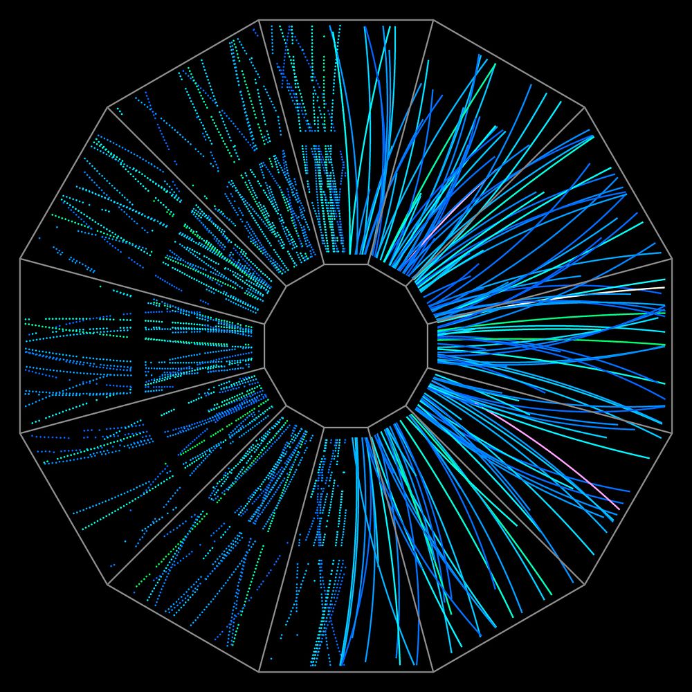 End view of a low-energy collision event at the STAR detector at the Relativistic Heavy Ion Collider (RHIC) shows particle…