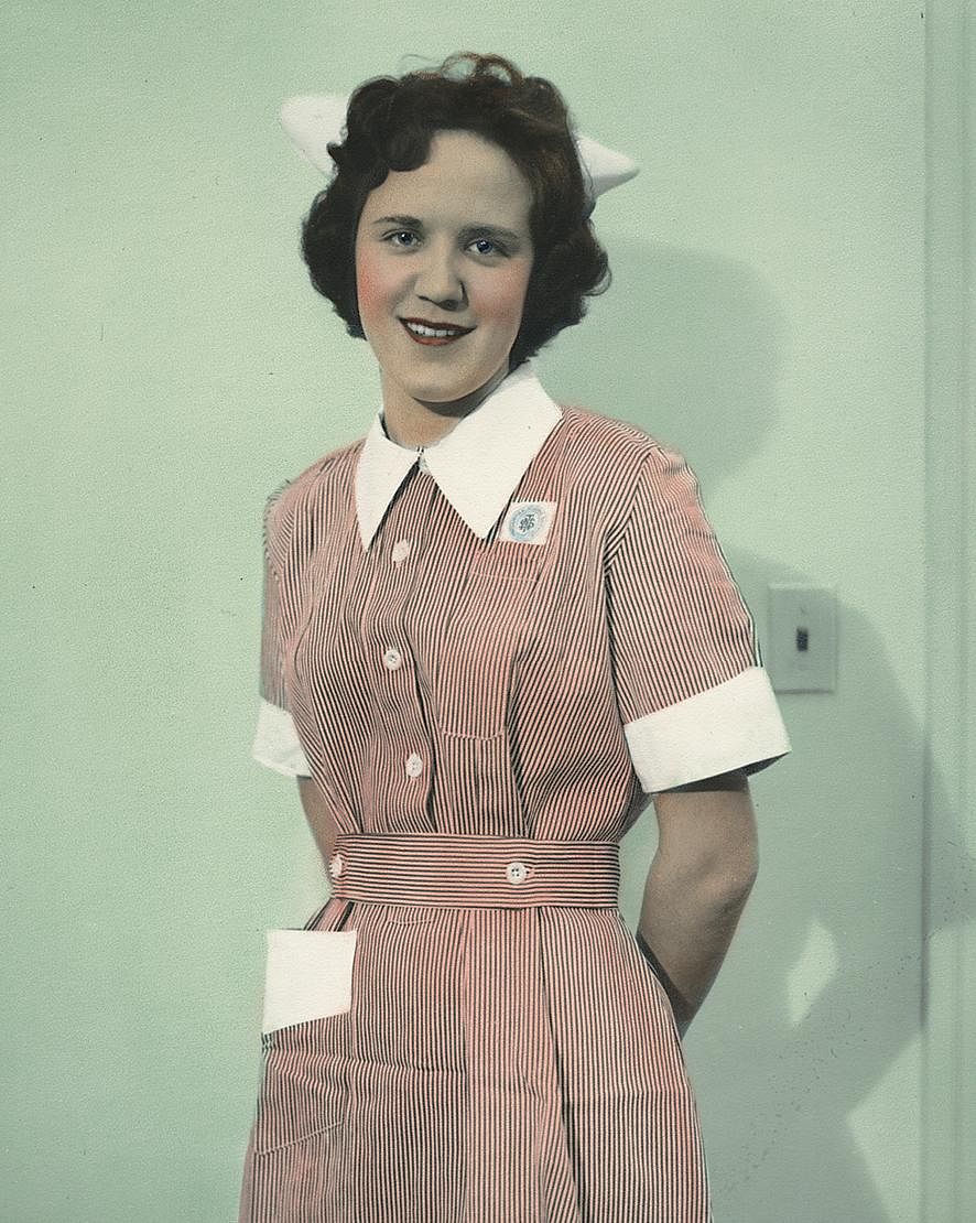 Nurse wearing uniform from Kenya. Original public domain image from Flickr
