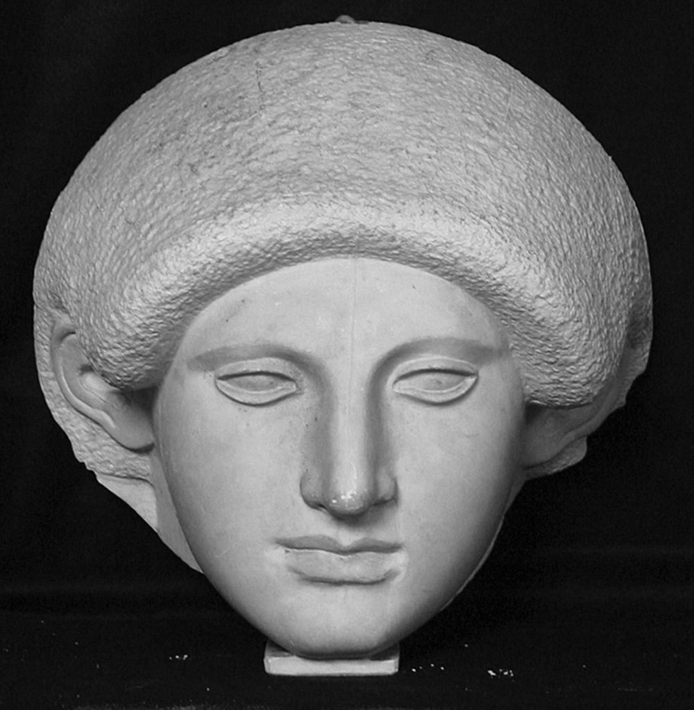 Female head from Egyptian sarcophagus lid
