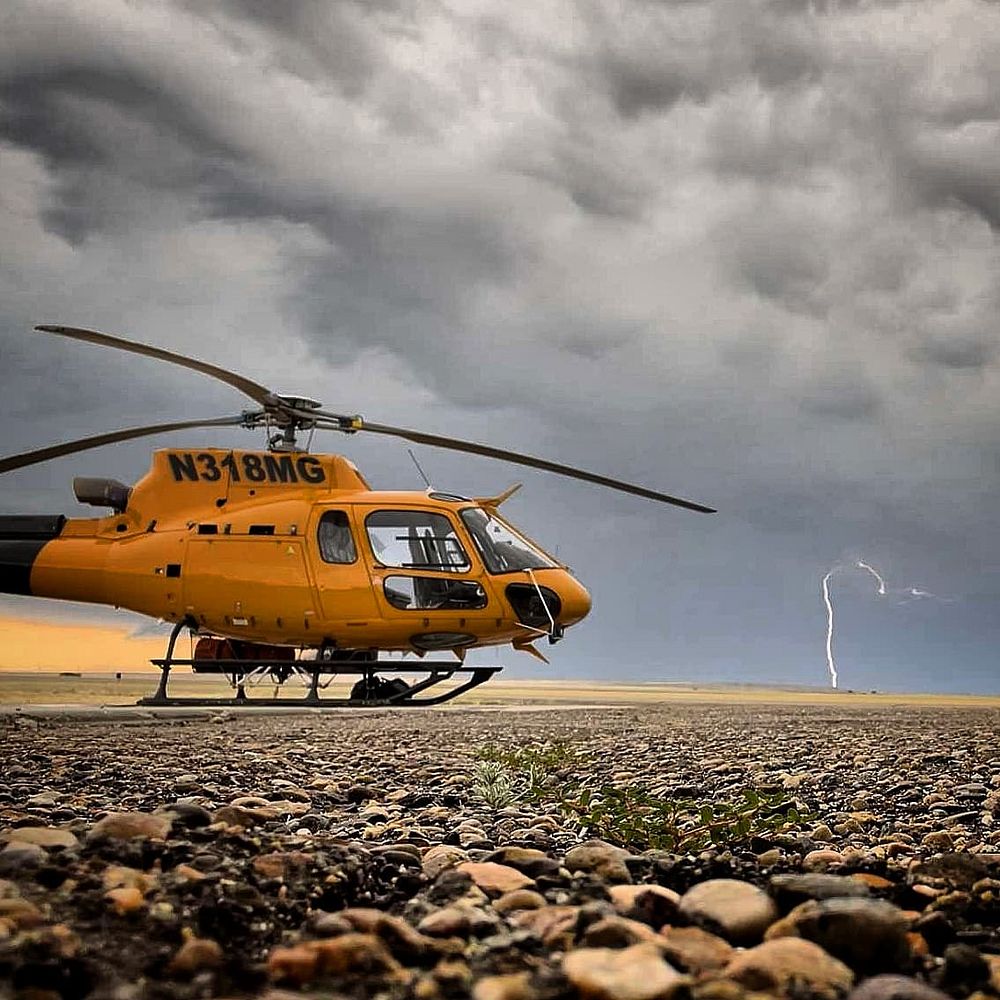 2022 BLM Fire Employee Photo Contest Category AviationThe Miles City Helitack ship stands by for an assignment as lightning…