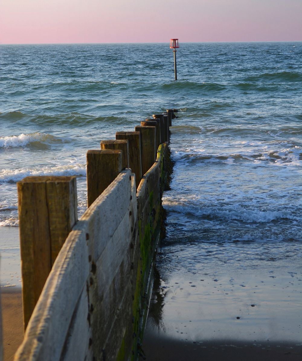 Waves crashing into the beach. Free public domain CC0 photo.