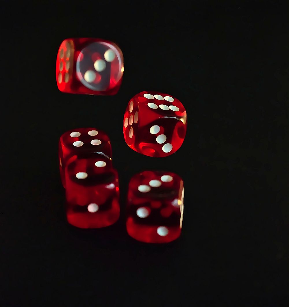 Red dice, gambling addiction. Free public domain CC0 photo.