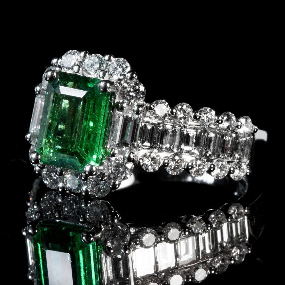 Green emerald diamond set ring. Free public domain CC0 photo.