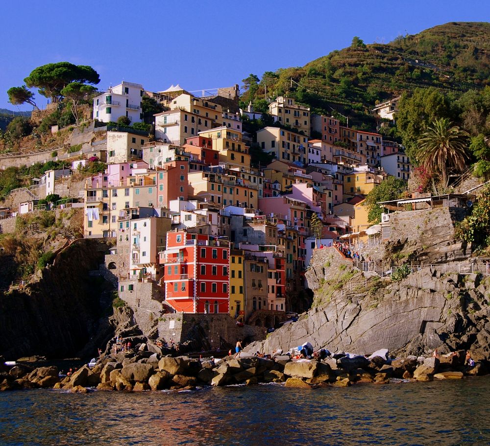 A view Cinque Terre from the coast. Free public domain CC0 photo.