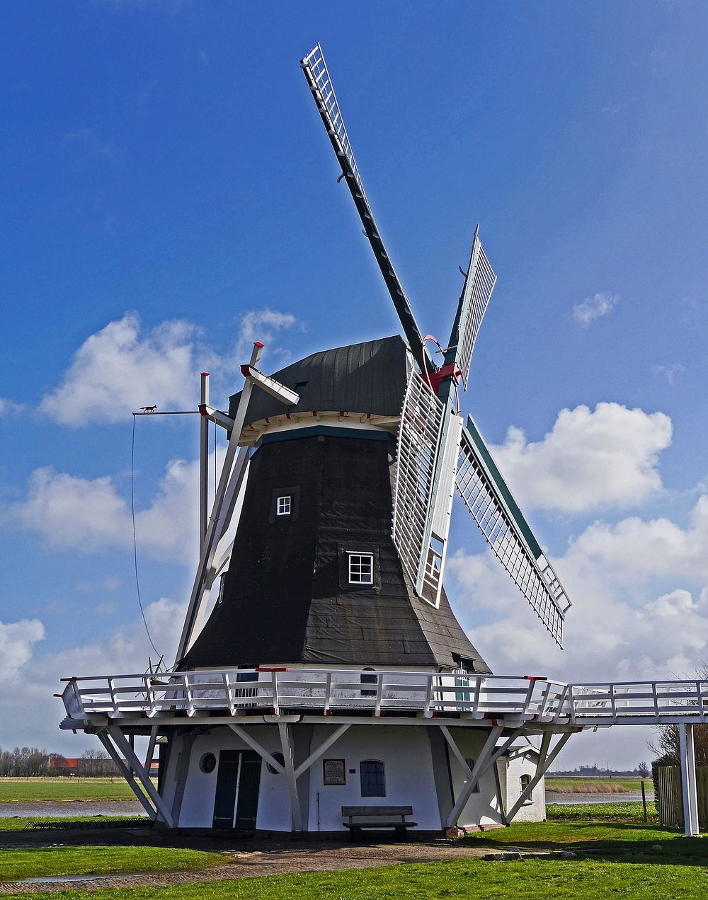 Old windmill in countryside. Free public domain CC0 image.