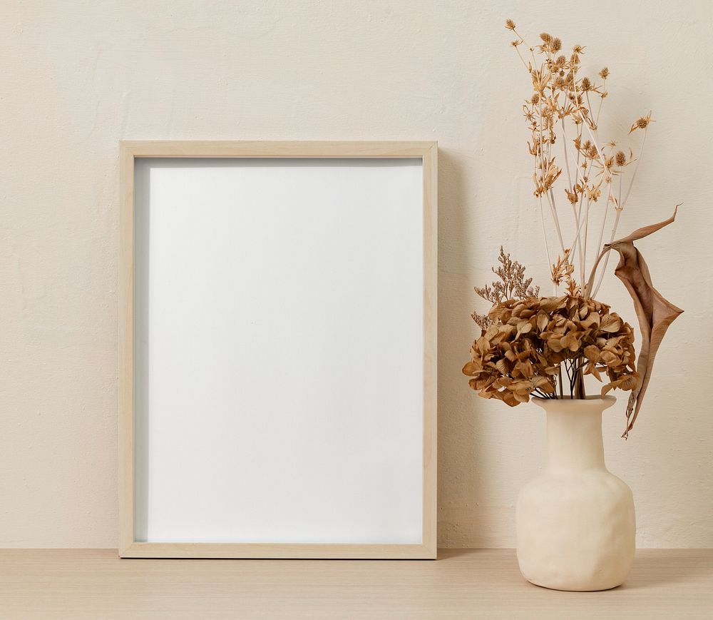 Blank picture frame, clean beige home interior decor