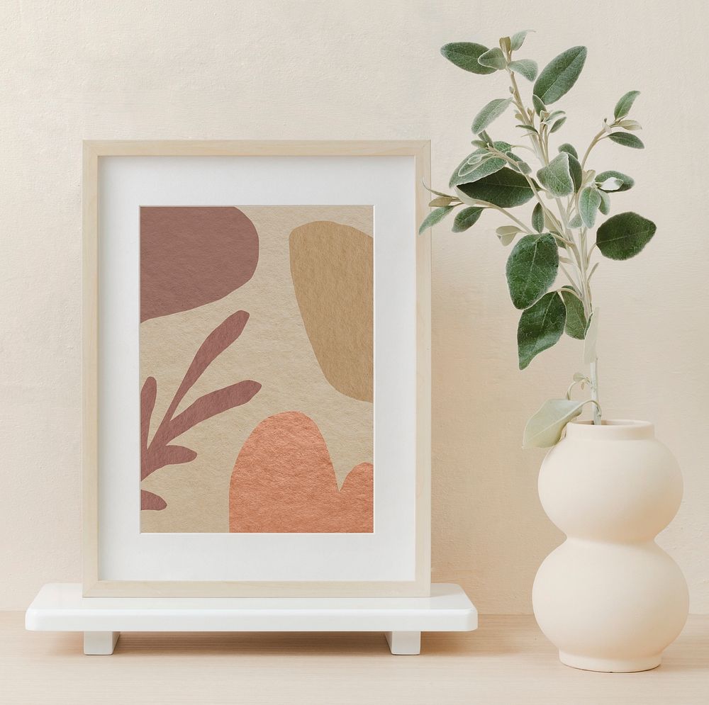 Abstract artwork, beige frame, clean home interior design