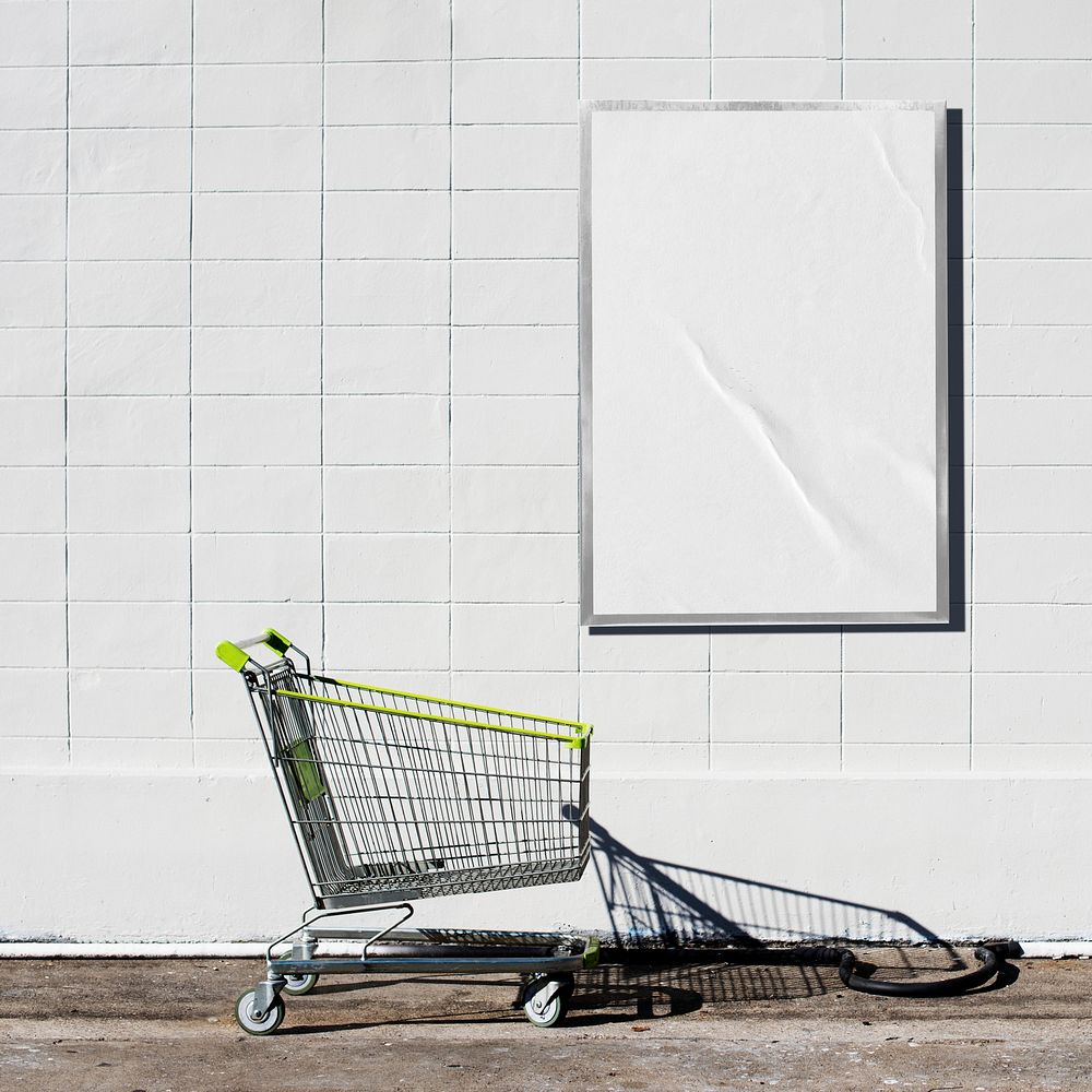 Blank poster on supermarket wall, advertisement design space
