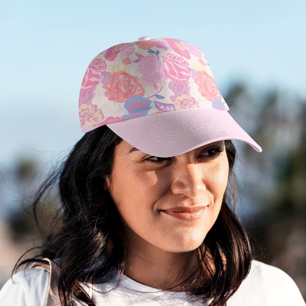 Beautiful Latina woman wearing a pink floral hat